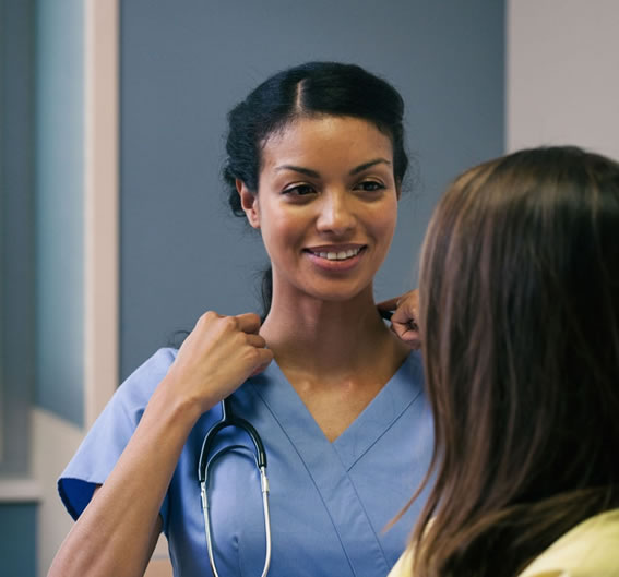 A clinician and patient discussing how much an abortion costs.